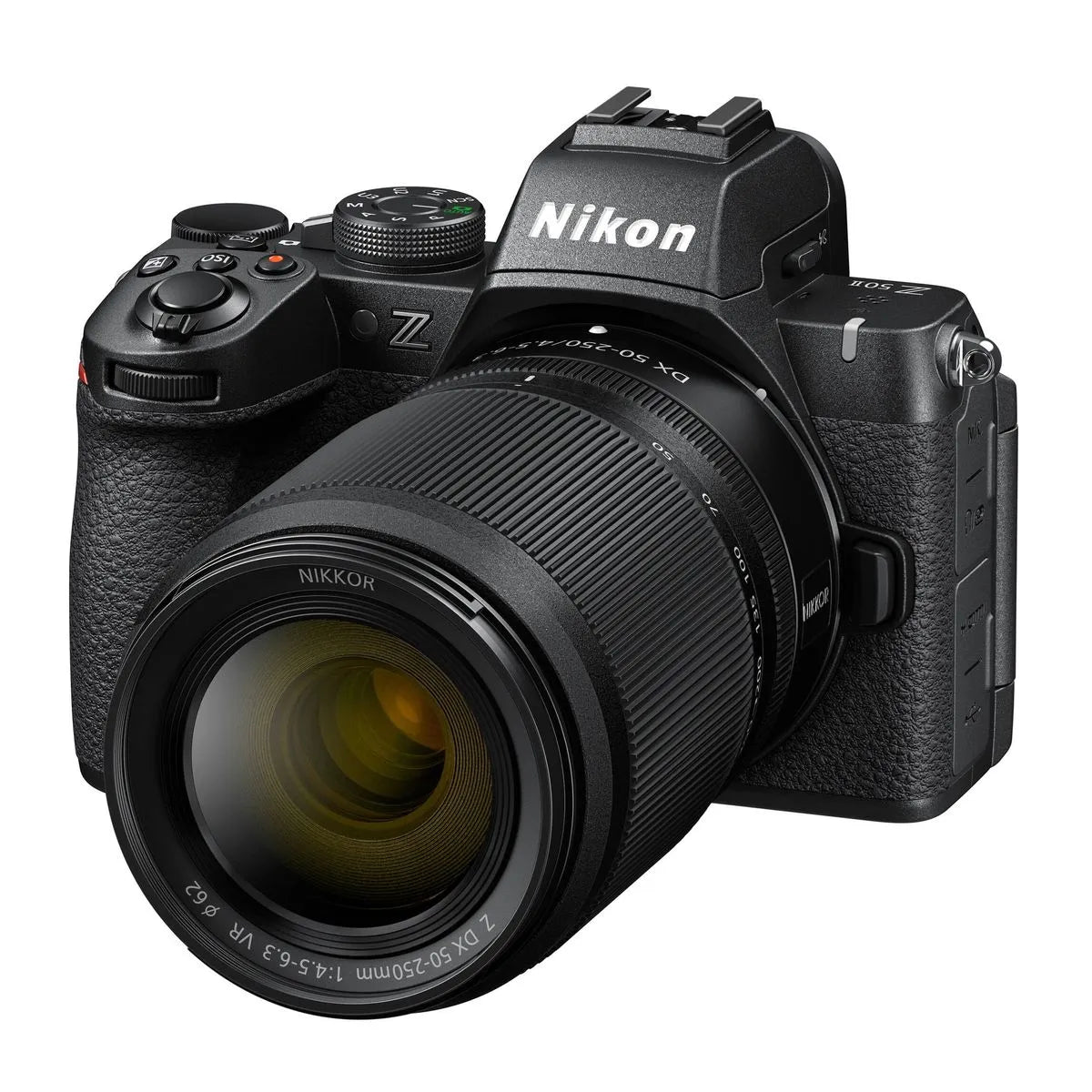 Angled view of black mirrorless camera with textured grip and 16-50mm VR lens