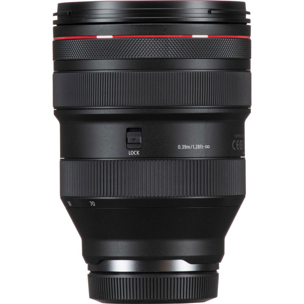 Black lens side with focus/zoom knurling, LOCK switch, and depth text markings