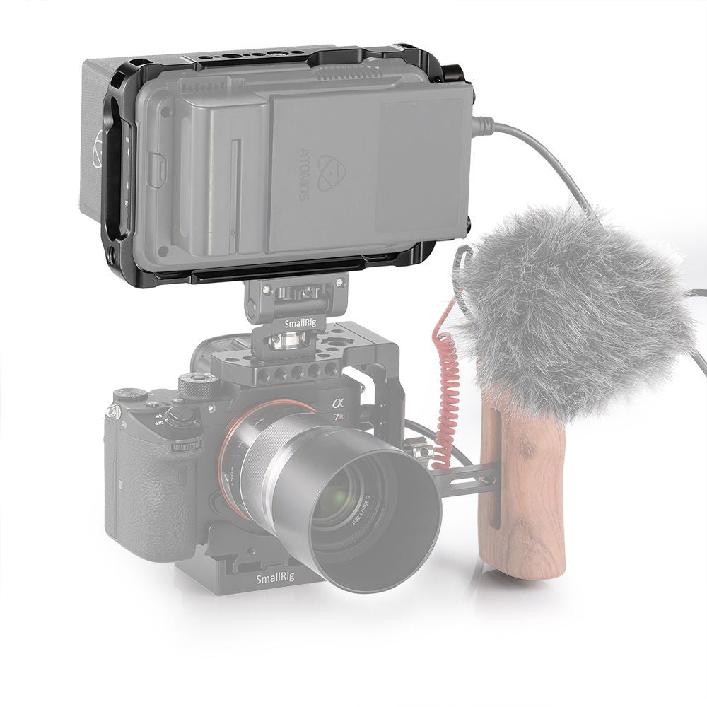Ninja V 5in cage on camera body with side rails and top mounting holes; mic