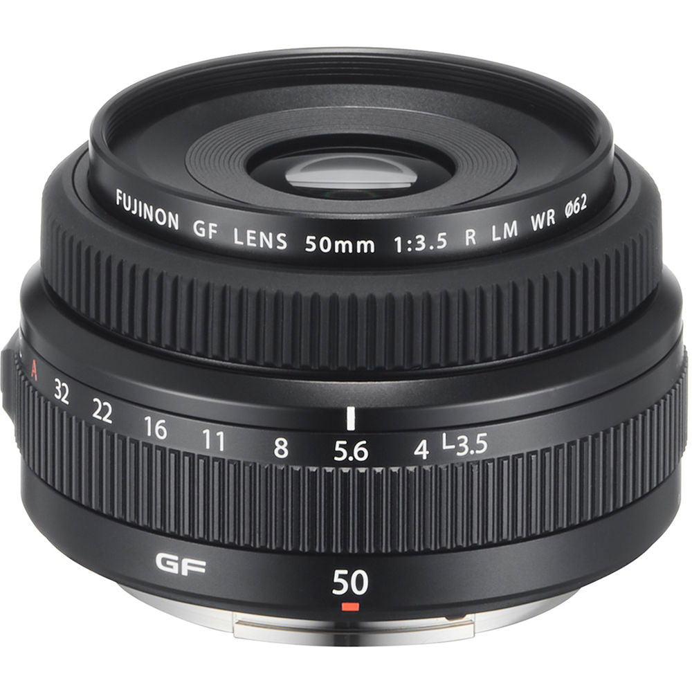 Black 50mm f/3.5 lens with front element opening and engraved focus/aperture rings