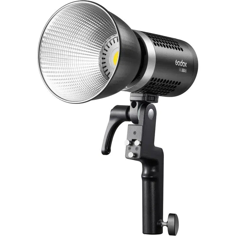 Bi-color LED lamp with silver reflector, black handheld grip, hot-shoe mount