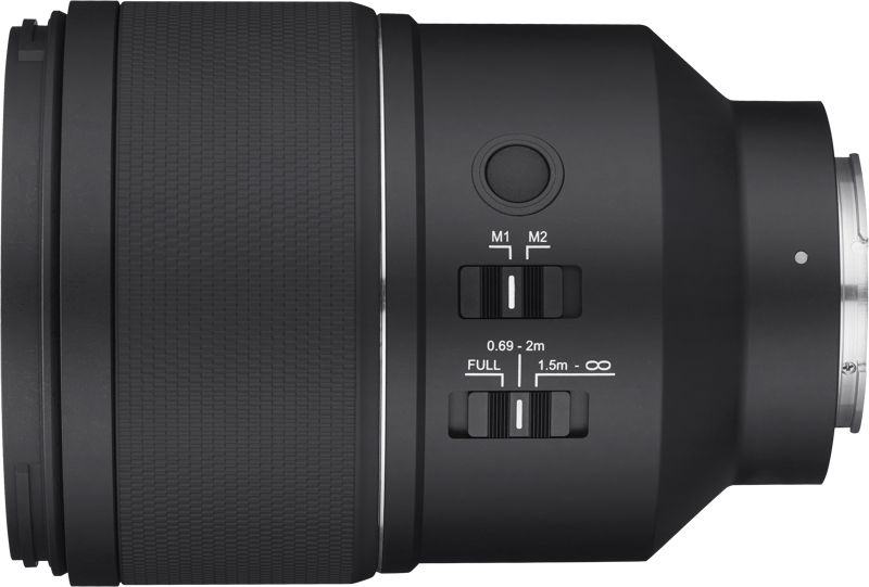 Black camera lens side view with focus mode markings M1/M2 and distance scale