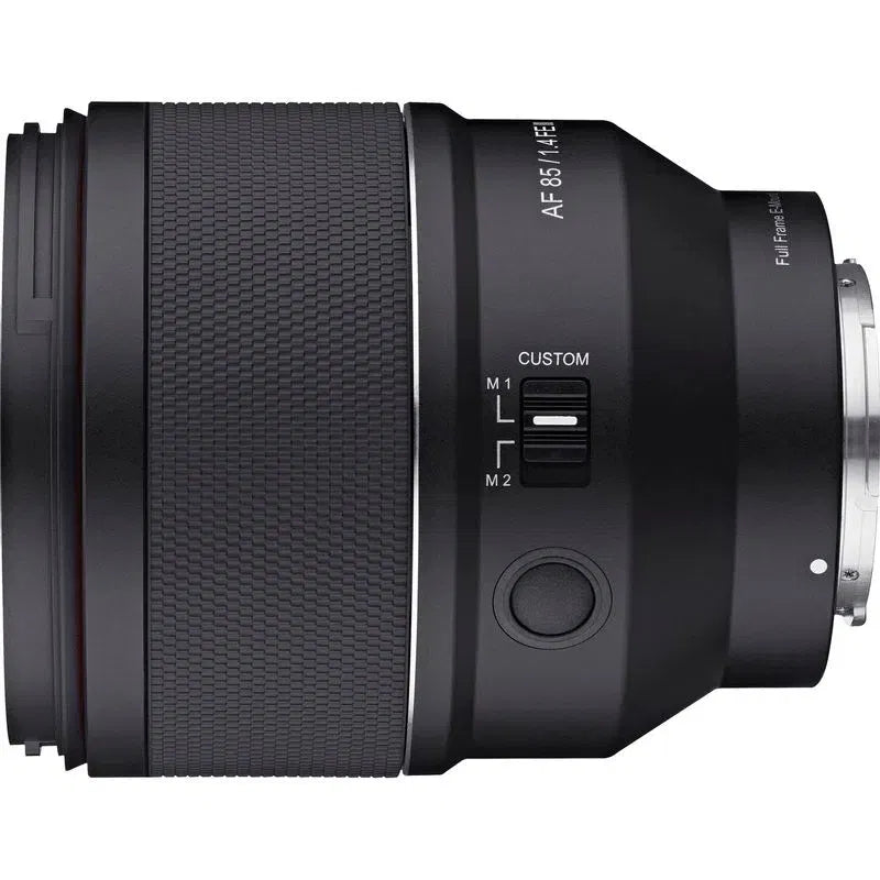 Side view of black 85mm F1.4 lens with custom M1/M2 switch and control dial