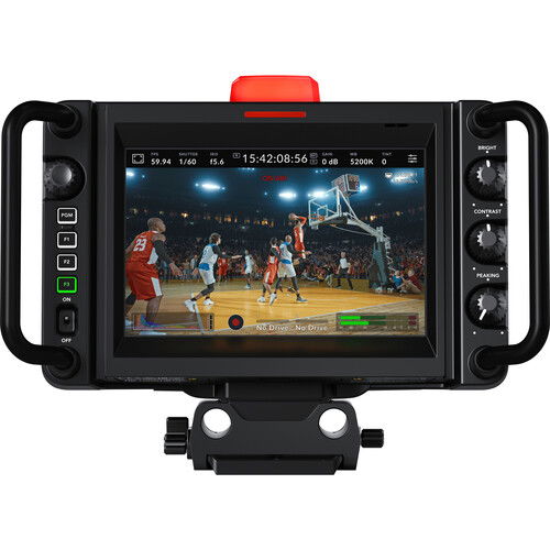 Camera rear with LCD screen, side controls, and red top marker