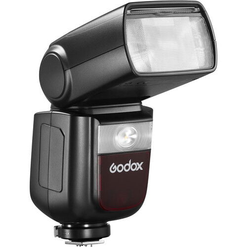 Black TTL speedlight with tilting flash head and front diffuser window