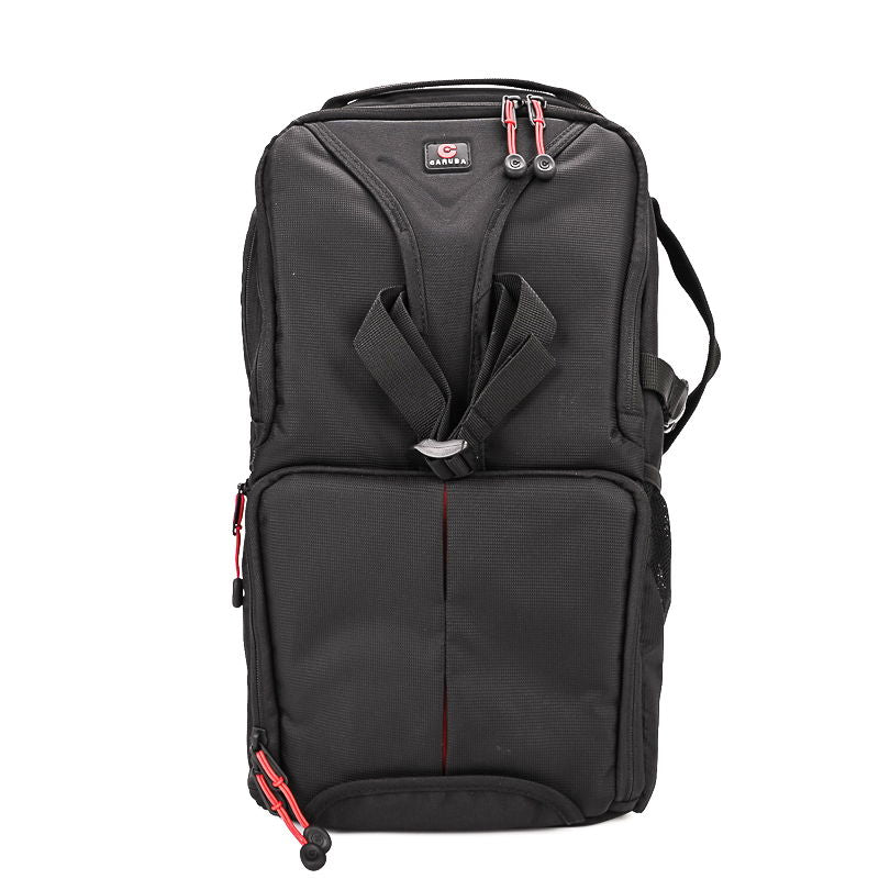 Andex 1 sling camera backpack, black with front logo and dual red zippers