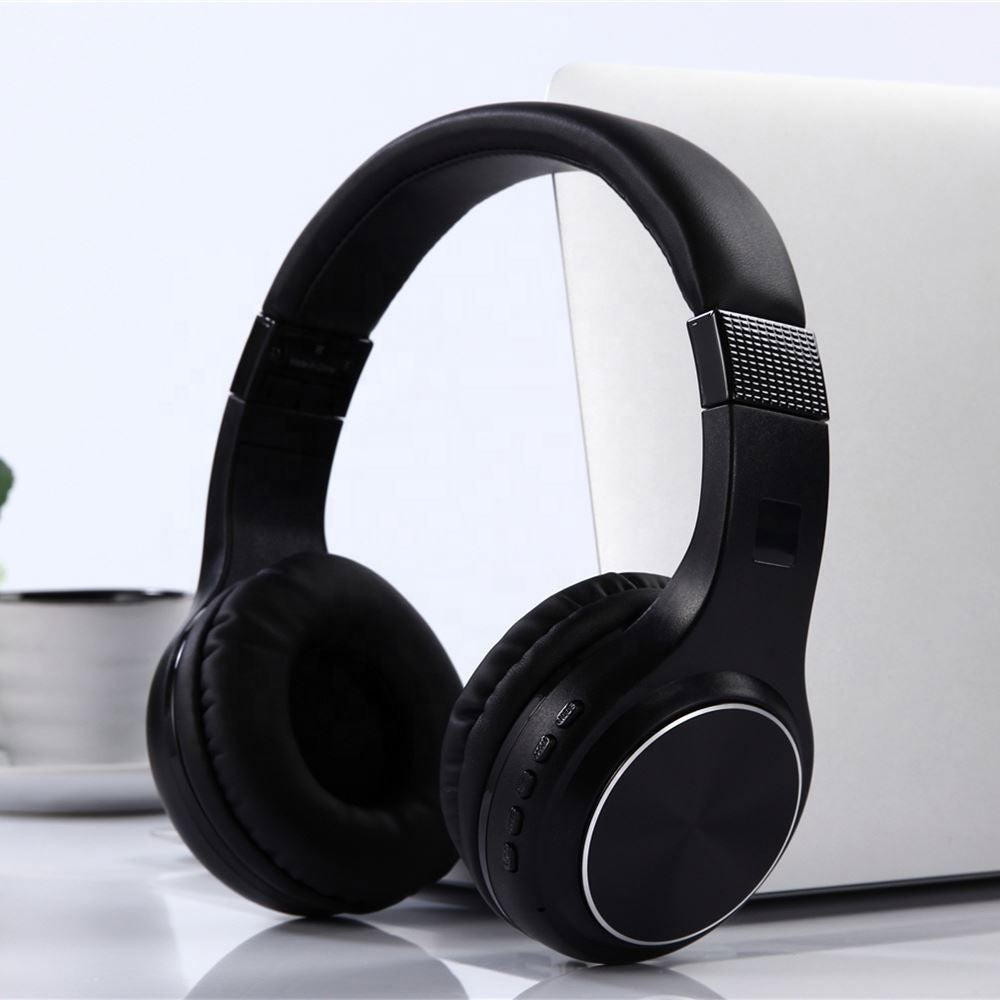 Black wireless over-ear headphones with padded headband and round cushioned ear cups
