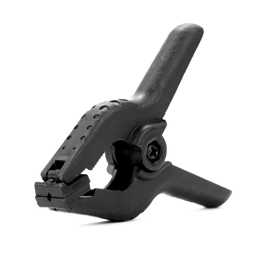 Black L-shaped background clamp with adjustable screw, prongs, and grip handle