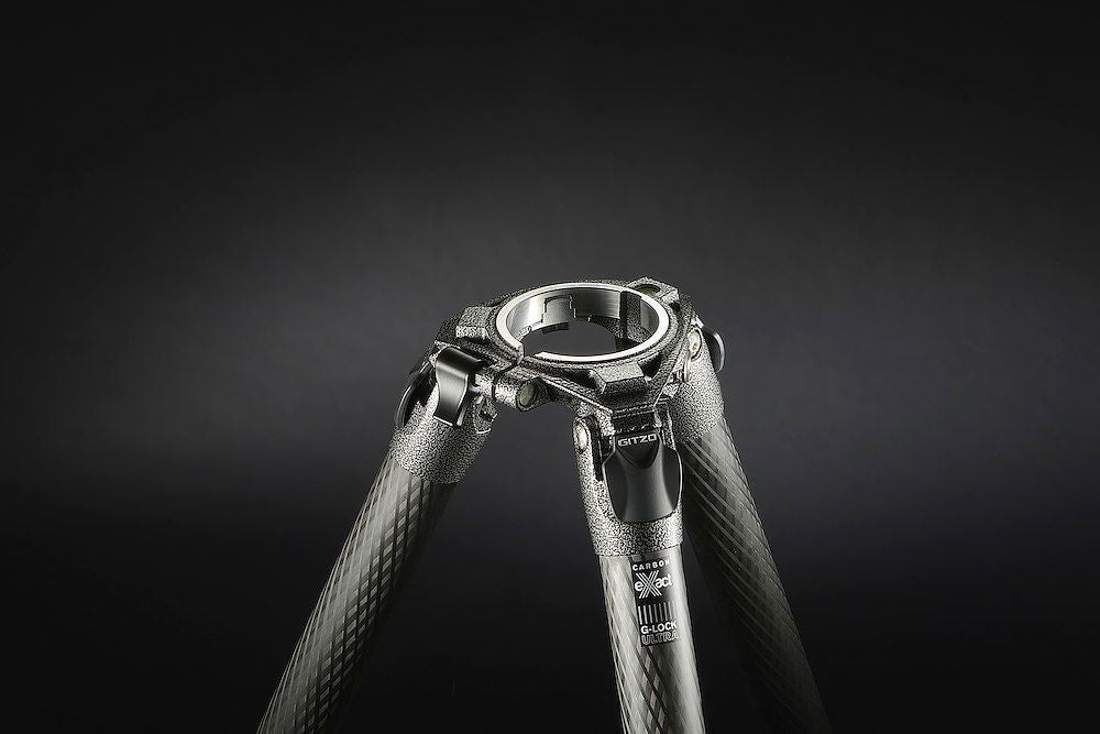 Tripod top with center hub and carbon-fiber legs, dark grey/black