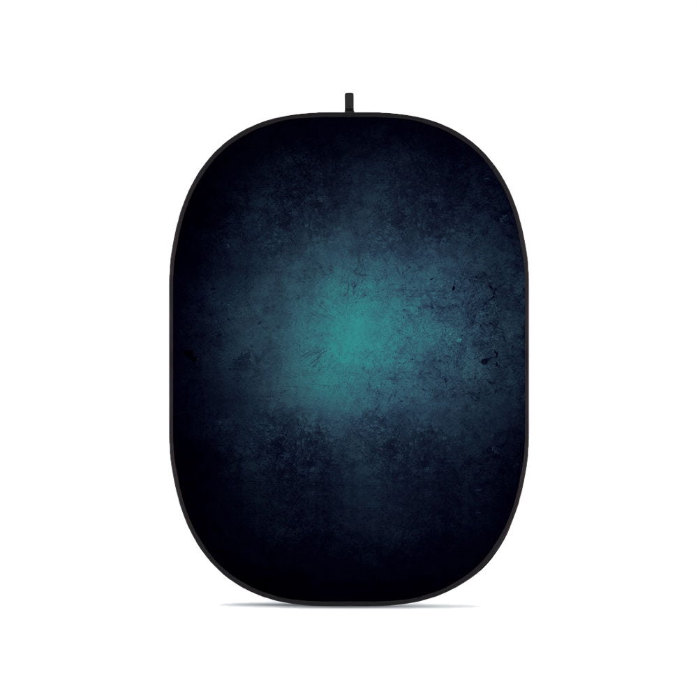 Collapsible oval photo backdrop with dark blue and teal mottled surface