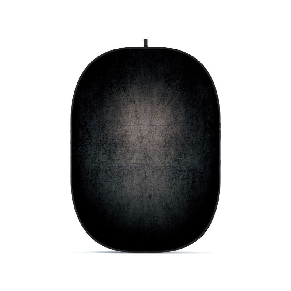 Collapsible oval photography backdrop, dark black fabric with textured surface