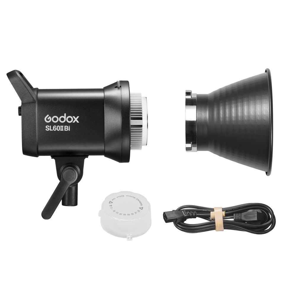 LED studio light kit with reflector head, white cap, and power cable