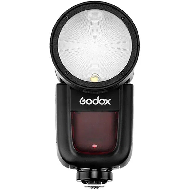 Round-head TTL flash unit with black body and front lamp window