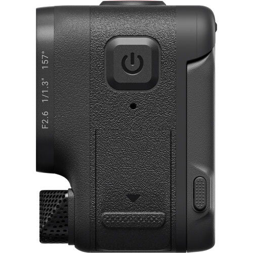 Black action camera side view showing power button and textured grip