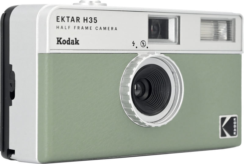 White and green half-frame camera showing circular front lens and flash window