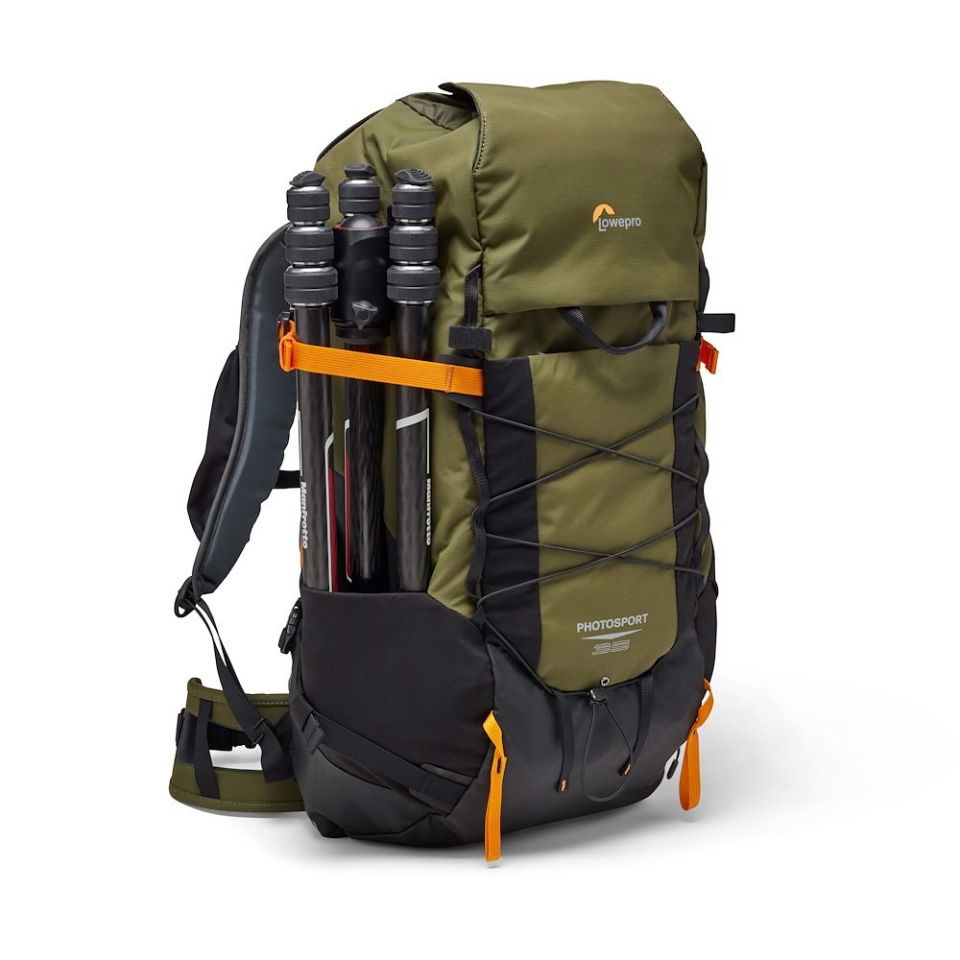 Olive camera backpack with side compartment holding camera lenses, black trim