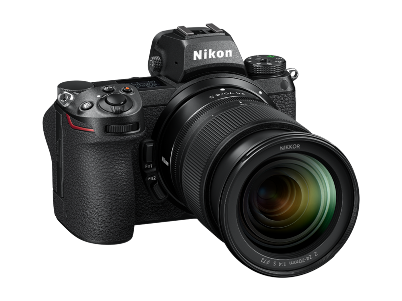 Mirrorless camera with 24-70mm lens, angled front view, top controls shown