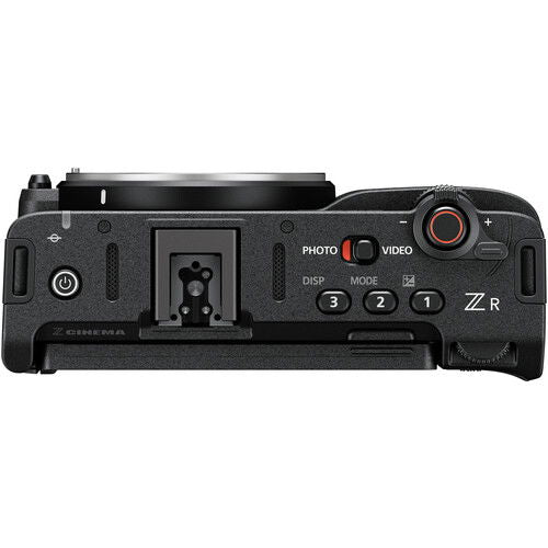 Top view of mirrorless camera body with mode buttons and REC control, black