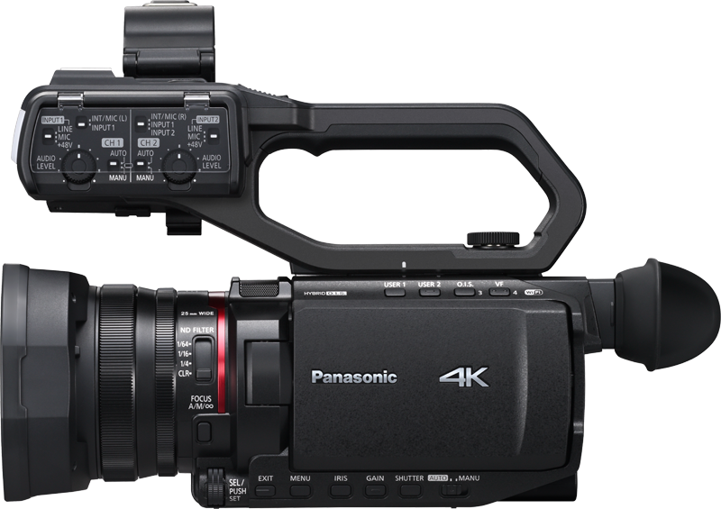 Side view camcorder with control panel buttons, input dials, and zoom lens ring