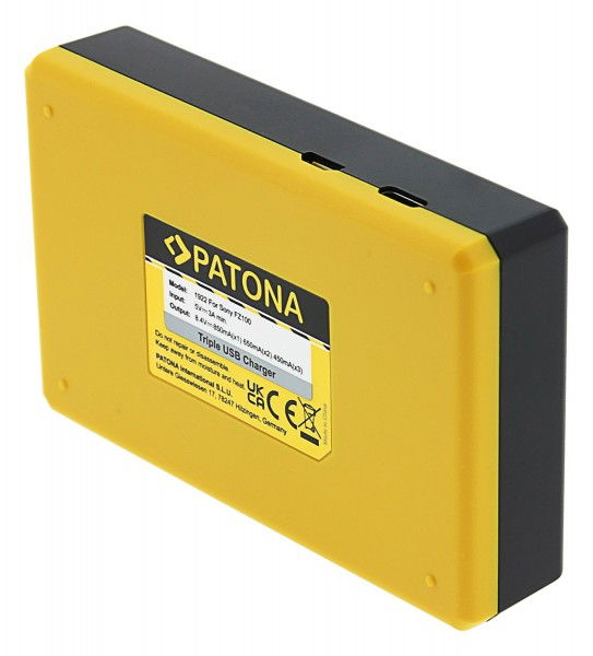 Back of triple USB charger for Sony NP-FZ100, yellow casing with label panel