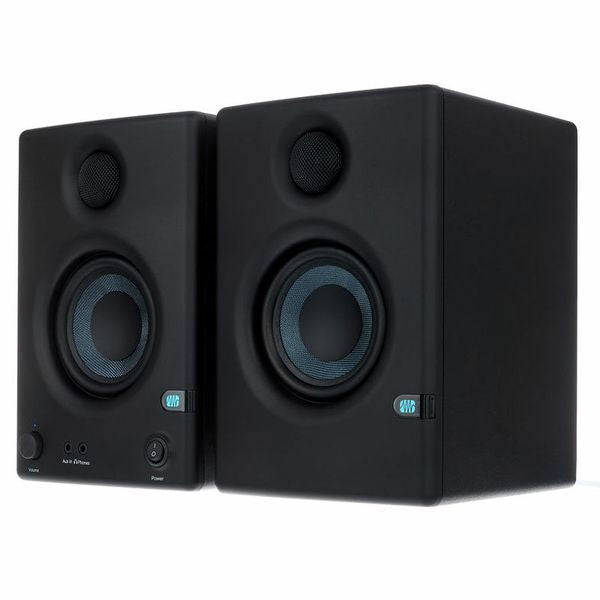 Black multimedia speakers, three-quarter view with tweeters and woofers facing forward