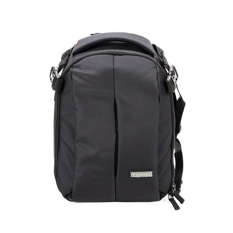 Black camera backpack with front zip pocket and padded top handle, side straps