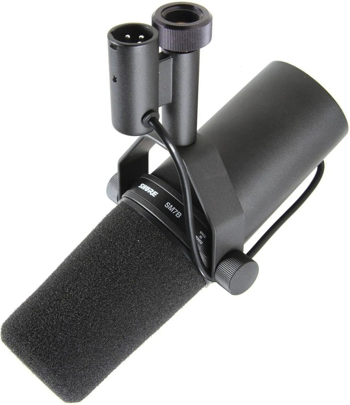 Broadcast/podcast microphone with foam windscreen, side view, black grille and body