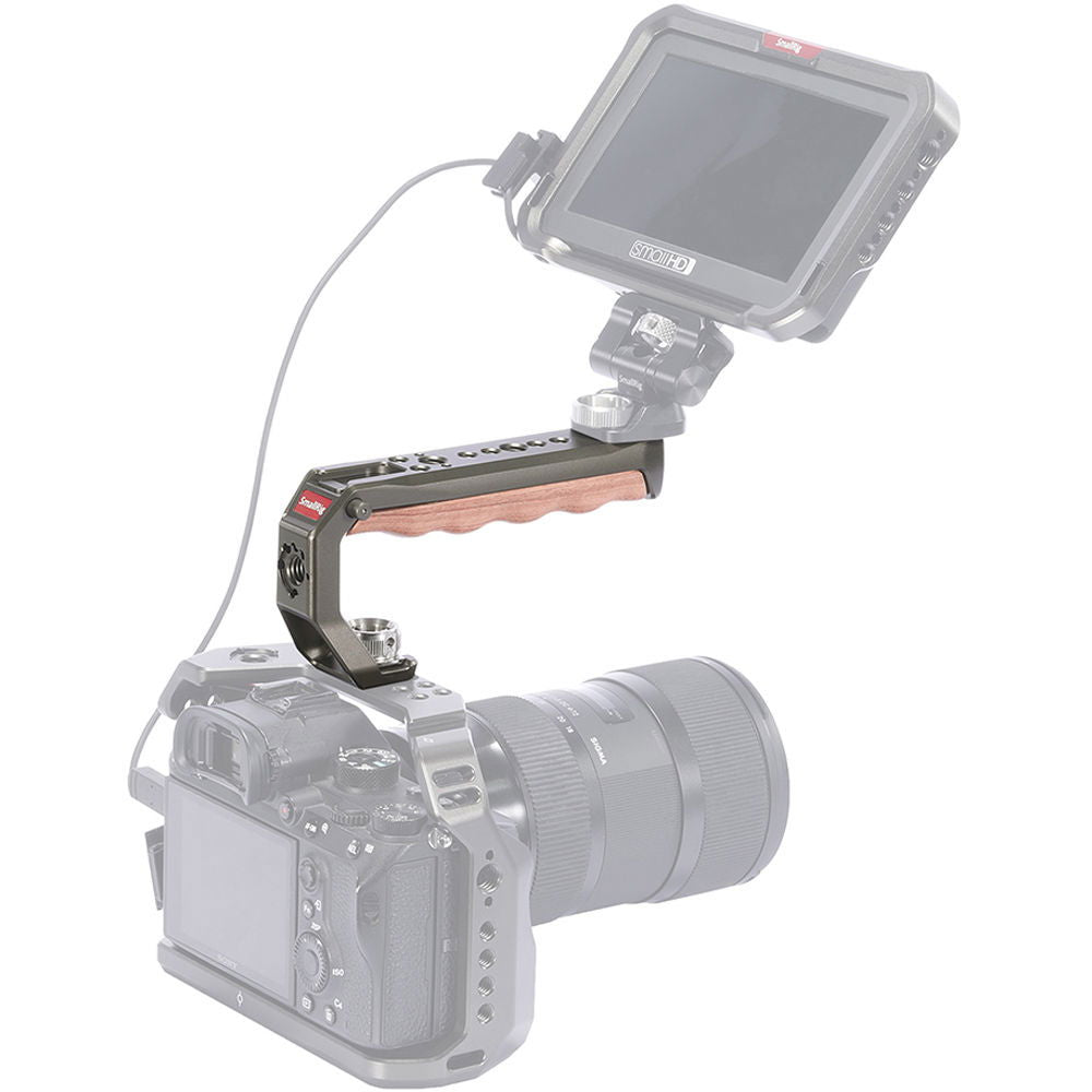Wood-grip gray ARRI handle mounted on camera with monitor on top