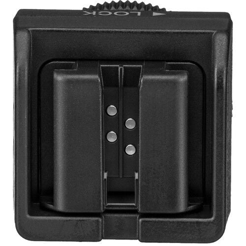 Black adaptor base with exposed internal contacts and central slot