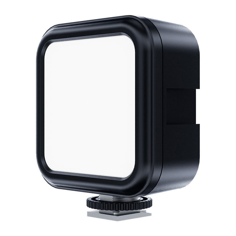 Modular square LED panel light head with front diffuser, tripod not visible
