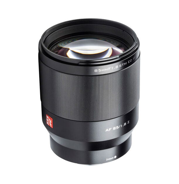 Black 85mm f/1.8 lens front view with engraved markings and front glass