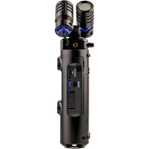 Side view of handheld audio recorder with dual microphones and USB/audio port area