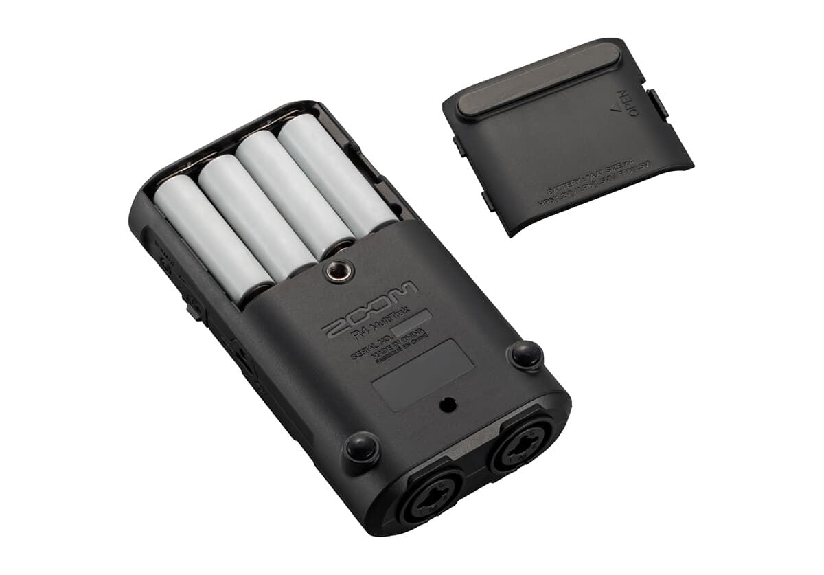 Back of Zoom R4 MultiTrak with battery cover and two audio ports
