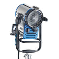 Blue ARRI Fresnel HMI spotlight with honeycomb lens and side controls