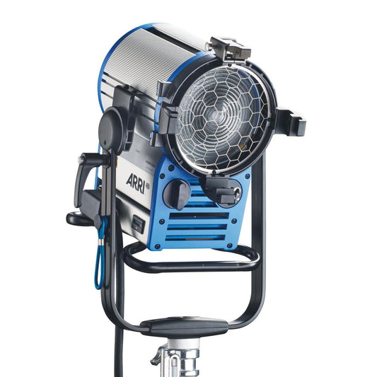 Blue ARRI Fresnel HMI spotlight with honeycomb lens and side controls