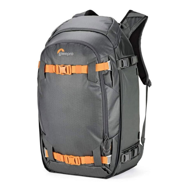 Gray camera backpack with orange webbing, padded top, and front utility straps