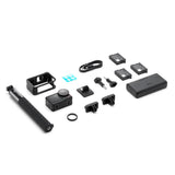 Set accesorii pentru cameră: suport, cabluri, baterii și elemente de montaj