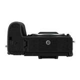 Mirrorless camera underside view with tripod mount and rear panel