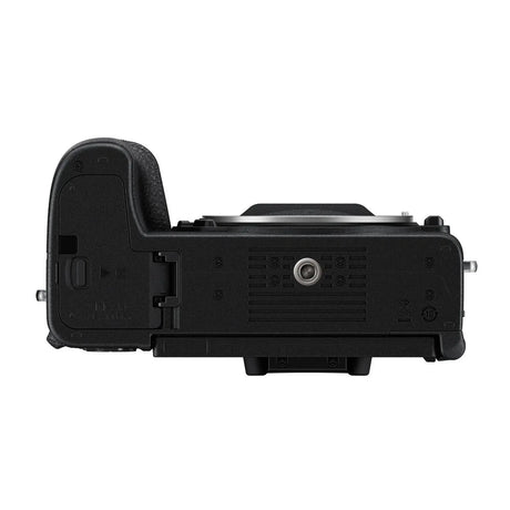 Mirrorless camera underside view with tripod mount and rear panel