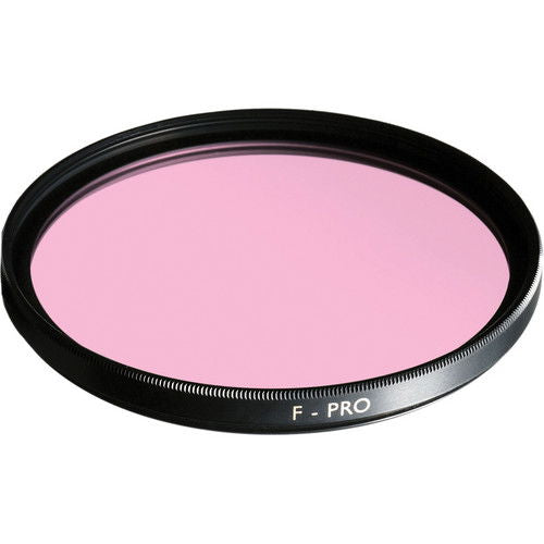 Circular camera lens filter with black rim, pink glass, marked “F-PRO”
