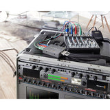 Mini converter on a video rack with multicolor cables and SDI connector ports
