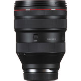 Black lens side with focus/zoom knurling, LOCK switch, and depth text markings