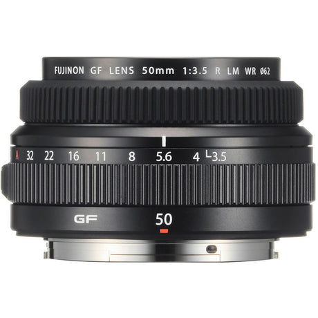 Black 50mm f/3.5 mirrorless lens with textured focus ring and engraved aperture scale