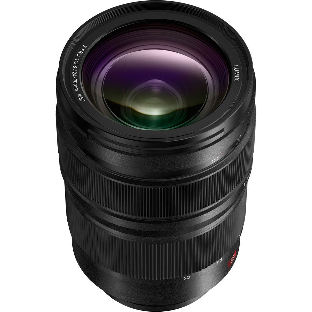 Lumix S Pro 24-70mm f/2.8 lens angled view, front glass with purple reflections