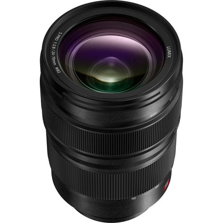 Lumix S Pro 24-70mm f/2.8 lens angled view, front glass with purple reflections