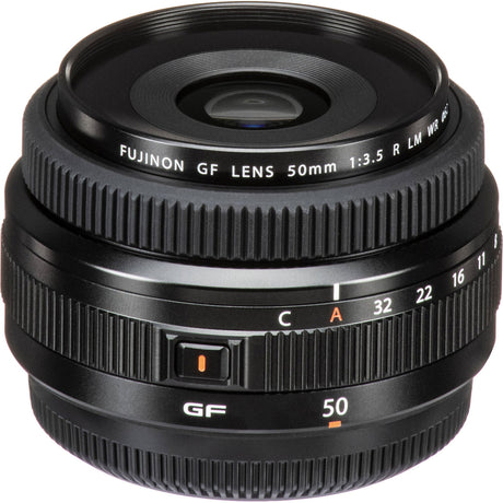 Black 50mm f/3.5 lens with C/A switch tab, ribbed barrel, and front element