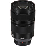 Lumix 24-70mm f/2.8 lens from above, black barrel with zoom and focus grooves