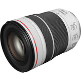 Angled view of black and silver 70-200mm F4 telephoto lens, front glass and red band
