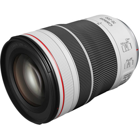 Angled view of black and silver 70-200mm F4 telephoto lens, front glass and red band