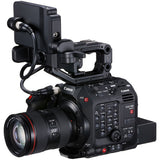 Side view cinema camera with attached monitor and array of control buttons